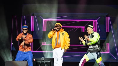 From left, singers apl.de.ap, will.i.am and Taboo of Black Eyes Peas will perform at Expo 2020 Dubai in January. Invision / AP