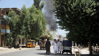 Smoke rises from a building during the militant attack in Jalalabad, Afghanistan, on July 31, 2018. AP Photo