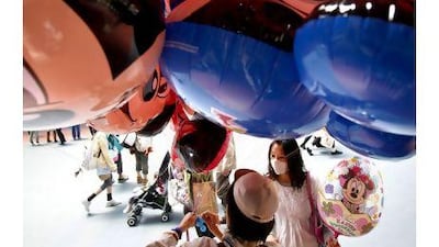 A worldwide shortage of helium has led Tokyo Disneyland to stop selling balloons filled with the gas. Kiyoshi Ota / Bloomberg News