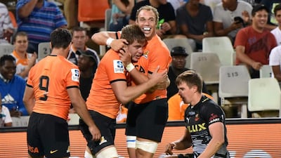 Jaguares players celebrate after winning in their Super Rugby debut against Central Cheetahs on Friday night. Charl Devenish / AFP / February 26, 2016