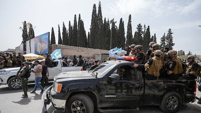 Syrian security forces escort a convoy of SDF fighters leaving the city of Aleppo, as part of an agreement with the Syrian government. EPA