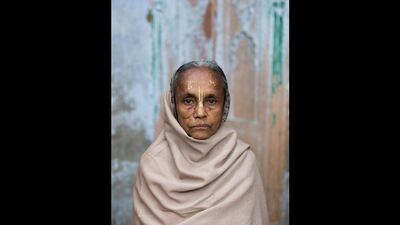 Lakhi Dasi, 76. Dasi has lived at the ashram for ten years and says, 'The prayers here help me to live. They bring me joy.'