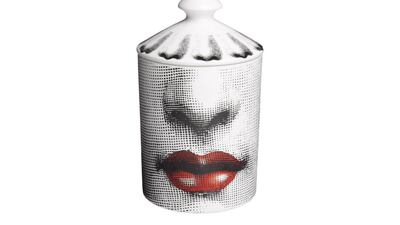 Scented candle, Dh725, Fornasetti at Ounass . Courtesy Ounass