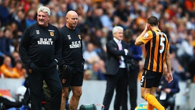 Hull City and manager Steve Bruce, left, no longer have their Premier League destiny in their own hands. Richard Heathcote / Getty
