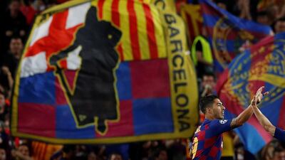 Suarez celebrates scoring their first goal. Reuters