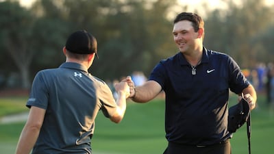 Matthew Fitzpatrick, left, and Patrick Reed, right, are locked in a battle for both the DP World Tour Championship title and Race to Dubai Order of Merit crown. Getty Images