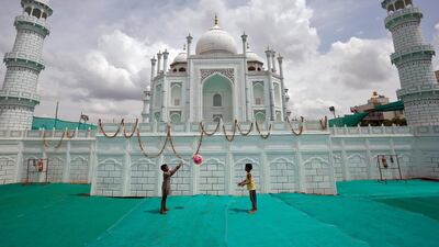 Children in front of a replica of the Taj Mahal at a fairground in Bengaluru. The city is leading a tourism boom. Reuters