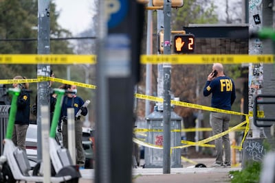 FBI officers near Buford's bar in downtown Austin, Texas, on March 1. Getty Images via AFP