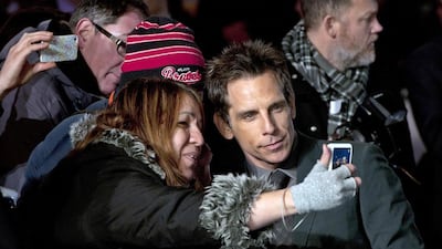 Ben Stiller, right, poses for a selfie with a fan at the European premiere of Night at the Museum: Secret of the Tomb. Hannah McKay / EPA