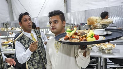 Running from 10pm until 2am, the team are under pressure to get things right in difficult circumstances. Victor Besa / The National