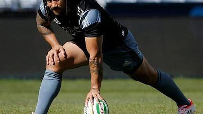 Ma'a Nonu stretches during a training session for New Zealand's All Blacks Rugby Union team in Sydney, August 15, 2014. The All Blacks play against Australia's Wallabies in their first Bledisloe Cup game in Sydney on Saturday. REUTERS/Jason Reed