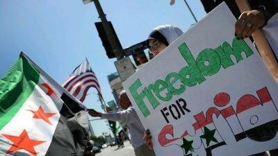 A demonstration demanding freedom in Syria yesterday in front of the CNN building in Hollywood, California. Gabriel Bouys / AFP Photo