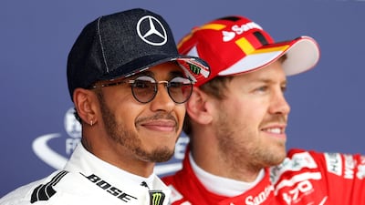 Lewis Hamilton, left, and Sebastian Vettel, right, are the main title protagonists as the 2017 F1 season resumes in Belgium. Andrew Boyers / Reuters