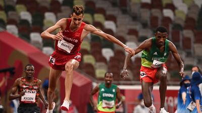Morocco's Soufiane El Bakkali with Ethiopia's Lamecha Girma.