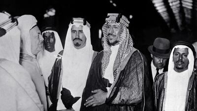 Saudi Arabia King Saud ibn Abdalaziz jokes during a meeting in 1953 in Riyadh. He succeeded his father, King Ibn Saud, in November 1953 but in March 1958 he bowed to pressure from the royal family and conferred full powers to Crown Prince Faisal ibn Abdalaziz and abdicated in November 1964. He died in February 1969. Photo AFP