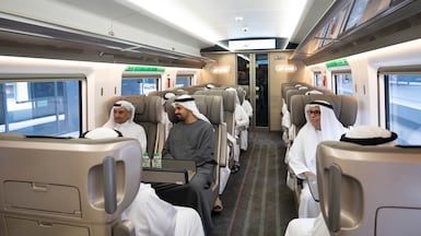 Sheikh Hamad bin Mohammed Al Sharqi, Ruler of Fujairah, Sheikh Mohammed bin Hamad Al Sharqi, Crown Prince of Fujairah, and Sheikh Theyab bin Mohamed, Deputy Chairman of the Presidential Court for Development and Fallen Heroes' Affairs, and chairman of Etihad Rail, on the train leaving Fujairah station. Photo: Wam