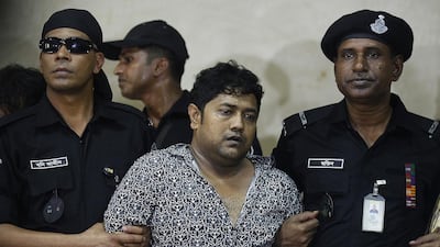 Rana Plaza owner Sohel Rana (centre) has been jailed for three years for corruption. AFP