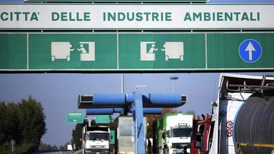 Trucks wait at the entrance of the Malagrotta landfill in December 2013. The Malagrotta landfill, Europe's largest, was closed last year after European Union authorities ruled it unfit to treat waste. Alessandro Bianchi / Reuters