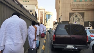 Day 10 — ‘I’ve just arrived Makkah (Mecca) to perform Umra which is a pilgrimage to Makkah which can be taken at any time. I prefer to walk the streets of Makkah rather than drive a traffic increases during Ramadan. All pilgrims wear 2 pieces of white dress when going performing the Umra.’ Ammar Al Attar for The National