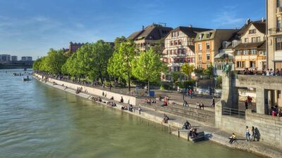 A view across the Rhine in Basel, Switzerland. The river neatly splits the city into two main districts: Grossbasel and Kleinbasel. Getty Images