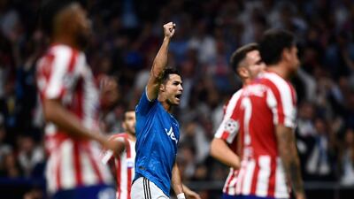 Juventus forward Cristiano Ronaldo reacts to a challenge. AFP