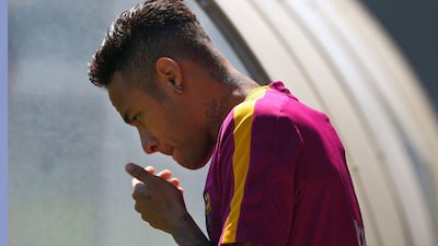 Barcelona’s Brazilian forward Neymar arrives to a training session at the Sports Centre FC Barcelona Joan Gamper in Sant Joan Despi, near Barcelona on April 16, 2016, on the eve of the final of the Copa del Rey match between FC Barcelona and Sevilla FC. Lluis Gene / AFP