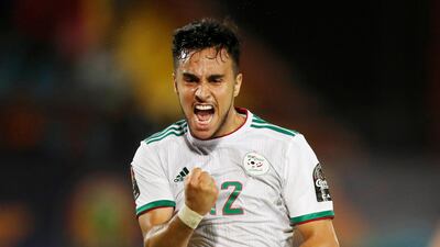 In Group C's other match on Monday, Algeria secured their place in the last 16 alongside Senegal with a 3-0 win over Tanzania. Adam Ounas celebrates scoring their second goal. Reuters