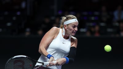 Petra Kvitova returns to Ashleigh Barty during their WTA FInal match in Shenzhen. Getty Images