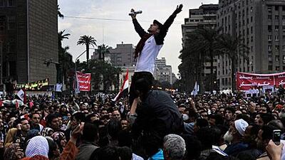 Egyptians protest against the ruling military council in Tahrir Square in Cairo yesterday. Egypt’s military ruler warned of “extremely grave” consequences if the nation does not pull through its current crisis and urged voters to turn out for the parliamentary elections starting today.