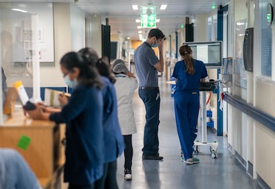 A recent review of Britain's state-funded National Health Service warned of long waiting times, overburdened hospitals and low public satisfaction. PA