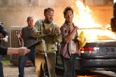 This photo provided by Frito-Lay North America shows a scene from Lay’s 2022 Super Bowl NFL football spot with Paul Rudd and Seth Rogan. Frito-Lay North America via AP