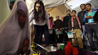 Pupils tour an exhibition organised by Médecins Sans Frontières in Amman.