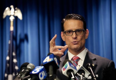 Riverside County District Attorney Mike Hestrin takes questions from the media at a news conference regarding the couple accused of starving and torturing their 13 children in California. Damian Dovarganes/ AP Photo