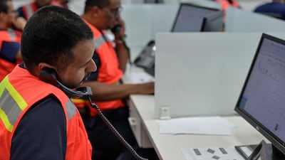 Employees of the Covid-19 coronavirus disease operations room of the Saudi Red Crescent (SRC) are seen while on duty in the Saudi capital Riyadh. AFP