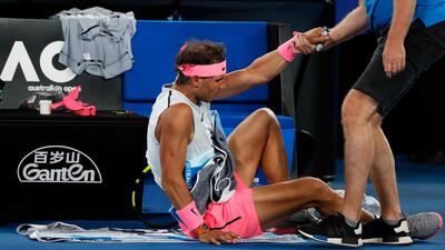 Rafael Nadal receives medical attention during his match against Croatia's Marin Cilic. Issei Kato / Reuters