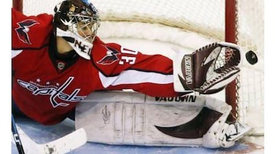 Michal Neuvirth is as cold as ice in the rink but coaches say the young Czech is a fiery, competitive guy. He just does not let that show.