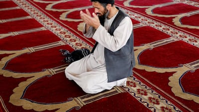 An Afghan man prays at a mosque during the holy month of Ramadan in Kabul, Afghanistan. Reuters