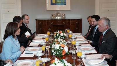 Jordanian King Abdullah II (R) accompanied by Crown Prince Hussein bin Abdullah (2-L) and US Vice President Kamala Harris (L), at the residence of the Vice President in the Naval Observatory in Washington.