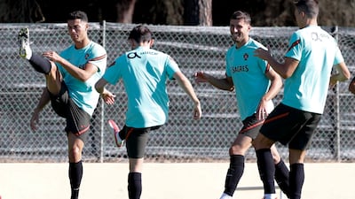 From left, Cristiano Ronaldo, Bernardo Silva, Ruben Dias and Joao Palhinha during Portugal's training session in Almancil. EPA
