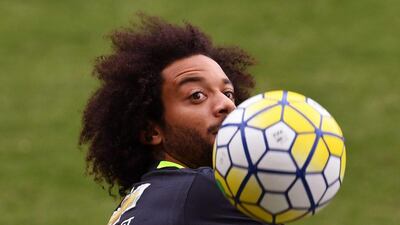 Brazil’s Marcelo controls the ball during training. Vanderlei Almeida / AFP