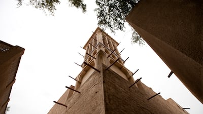 Wind towers, such as these beside Dubai Creek, were a traditional form of air conditioning. Razan Alzayani / The National