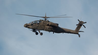 US Army soldiers flying an Apache helicopter at the Joint Readiness Training Center. (Photo by Greg Mathieson/Mai/Getty Images)