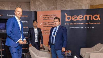 Balazs Horvath, Beema Insurance chief of staff (left) and Indraneel Jain, chief business officer, with Mr Garelli. Image: supplied