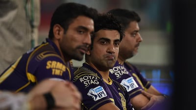 Kolkata captain Gautam Gambhir, centre, reacts after losing his team are beaten. Money Sharma / AFP