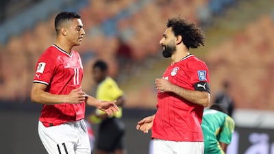 Mohamed Salah celebrates with Mostafa Mohamed after scoring a goal for Egypt. EPA