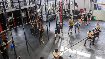 Unlike most other workouts, CrossFit allows participants to work out in tandem with one another, creating a community feel. Photo: Inner Fight