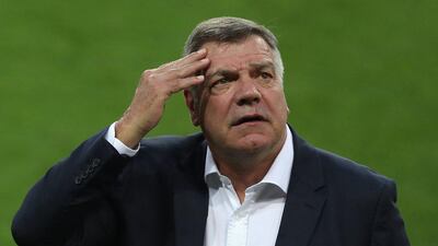England manager Sam Allardyce rubs his forehead as he inspects the pitch prior to the 2018 World Cup Qualifying Group F match against Slovakia at City Arena on September 3, 2016 in Trnava, Slovakia. Christopher Lee / Getty Images
