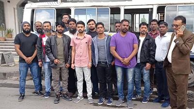 Indian sailors held in Yemen for 10 months before they were released on November 28. The 14 men transited through Dubai on their return to India on Sunday. Courtesy: Pravasi Legal Cell