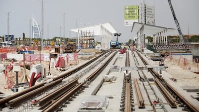 Tracks for the Al Sofouh Tram project in Dubai are being laid. The project, along with four other railway projects which the UAE is investing heavily into, is expected to benefit the national economy. Sarah Dea/The National