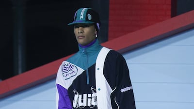 Abloh created a coat from a deconstructed track suit jacket. EPA